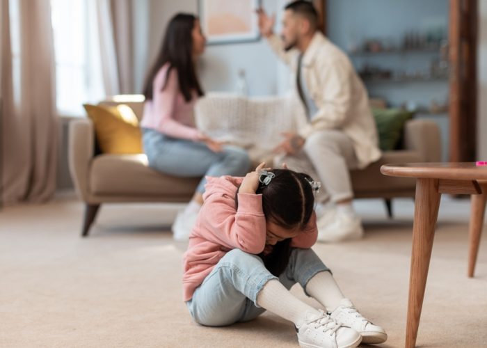 Family,Quarrels,And,Relationship,Problems.,Asian,Baby,Girl,Covering,Ears